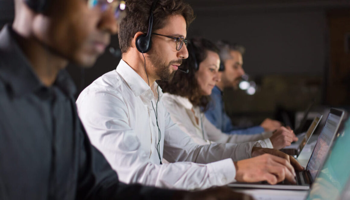 confident-call-center-operator-talking-with-client