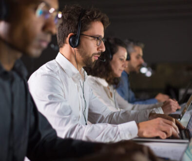 confident-call-center-operator-talking-with-client